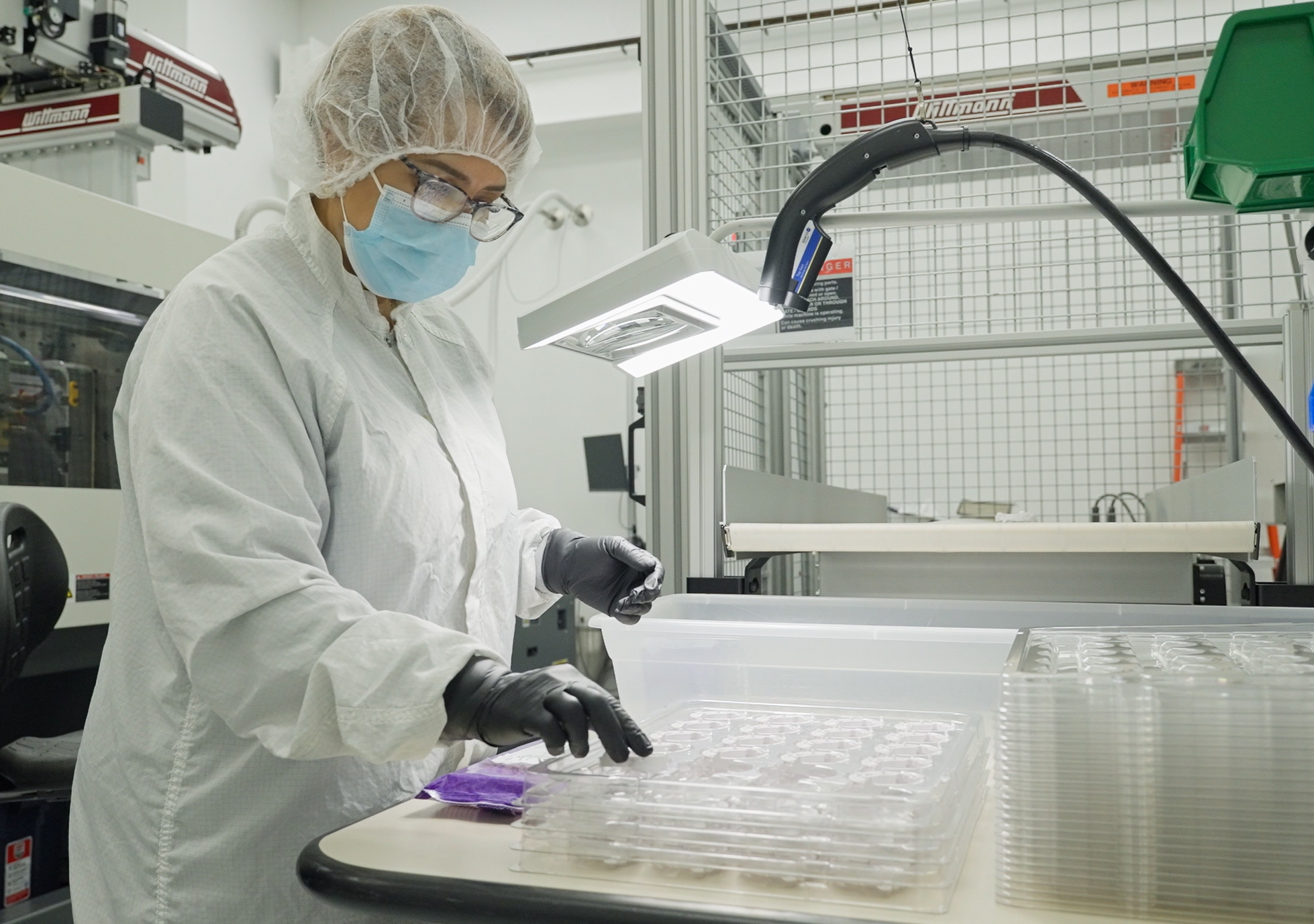 A Velosity employee works on thermoplastics.
